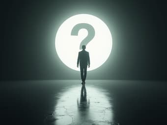 Person walking towards a bright light with a question mark, studio setup